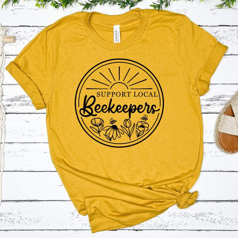 Soft cotton short sleeved tee in yellow with black imprint.  Support local beekeepers with flowers and bees.